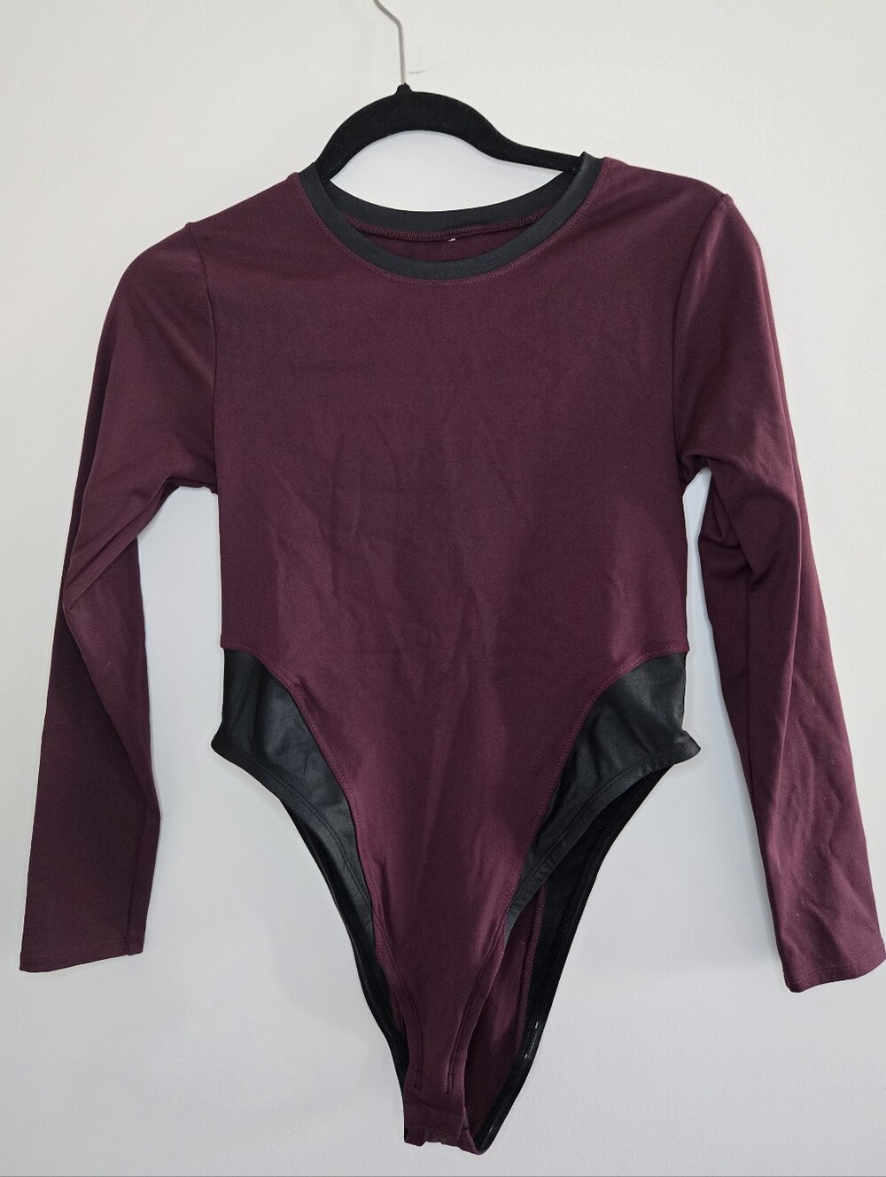Fabletics Long-Sleeve Bodysuit With Cut Out Back in Burgundy with Black Accents